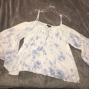 Long sleeve hangs off the shoulders